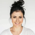 About 10 a woman with her hair pulled back